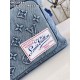 Exclusive M22534 】Montsouris shoulder bag with Monogram pattern embossed on faded denim, a personalized alternative to the classic design. The drawstring closure gives it a soft shape and the vintage label is from the br