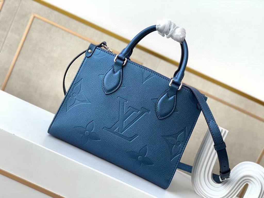 Top  M45653Blue M45661This Onthego mini shopper bag shows off the Monogram pattern to its best advantage, with large letters embossed on soft grained cowhide leather, an ample interior to hold a laptop and other office s