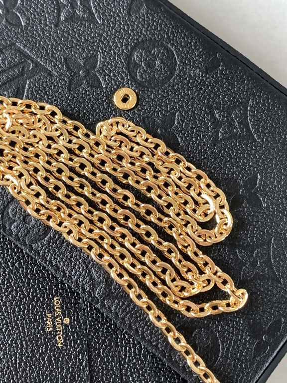 Top M64064 BlackThe Pochette Félicie chain bag is shaped like an envelope in Monogram Empreinte leather and embossed with the classic Monogram pattern. The ample compartments are complemented by a removable zipper pocket