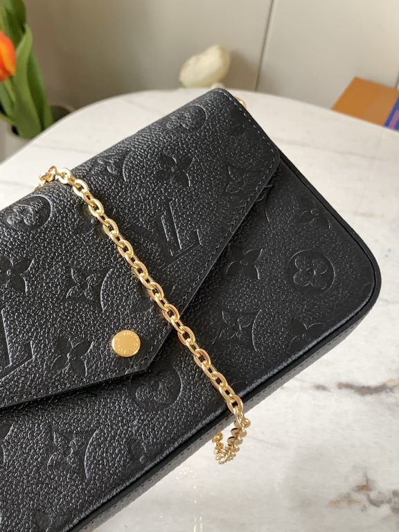 Top M64064 BlackThe Pochette Félicie chain bag is shaped like an envelope in Monogram Empreinte leather and embossed with the classic Monogram pattern. The ample compartments are complemented by a removable zipper pocket