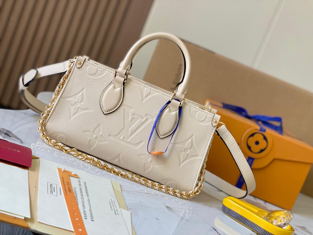 OnTheGo East West Handbag] [Extra Fine Original Leather   M23698 Milk WhiteIntroducing the Ays OnTheGo small tote bag design, the East West's ample shape is reimagined in Monogram Empreinte leather with a Giant Monogram 