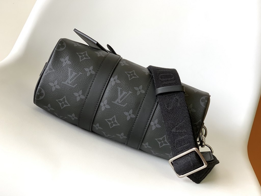 Top Original M46271 Black Flower Pillow Bag This Keepall 25 handbag is an elegant reinterpretation of Louis Vuitton's classic pattern in Monogram Eclipse Reverse canvas. Reinforced straps and a leather name plate continu