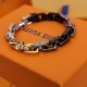 M0070MPARADISE CHAIN braceletThis Paradise Chain bracelet unleashes a striking personality through a multitude of colors and materials. Matte, polished and shiny metals create a rugged link, while the LV monograms give i