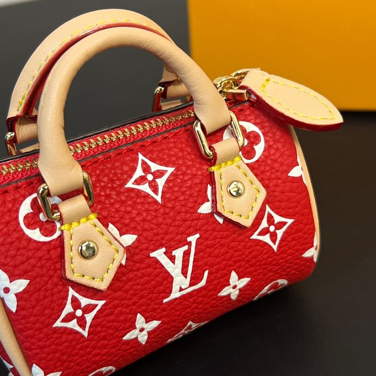 new   old pattern 5 colors In stock  MINI KEEPALL bag charm with keychain Louis Vuitton Louis Vuitton lv Mini Pillow Bag Pendant  This Mini Keepall bag and keychain is a bold and adventurous take on the classic handbag s