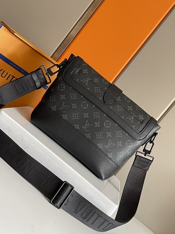 Top Original   Genuine Development, All Steel Hardware     This new messenger bag pays homage to Louis Vuitton's iconic equestrian-inspired Saumur handbag, launched in 1986, with a combination of Monogram Eclipse canvas 