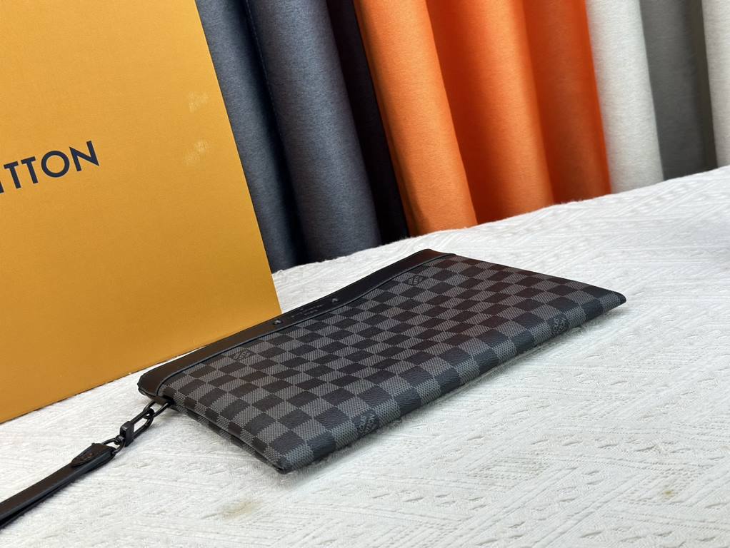 M81848 M81569 M82079 Exclusive! From Louis Vuitton's late 2022 Room with a View collection, the To-Go clutch is a poetic sunrise on Monogram Eclipse canvas, with floating clouds spelling out the LV logo and a vision of a