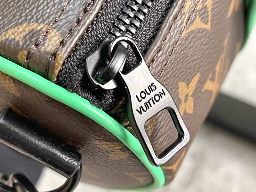 Exclusive to M20900, Louis Vuitton's iconic Keepall collection, the Monogram Macassar canvas is dipped in one of Virgil Abloh's signature brights, while the reinforced side straps and removable leather name tag continue 