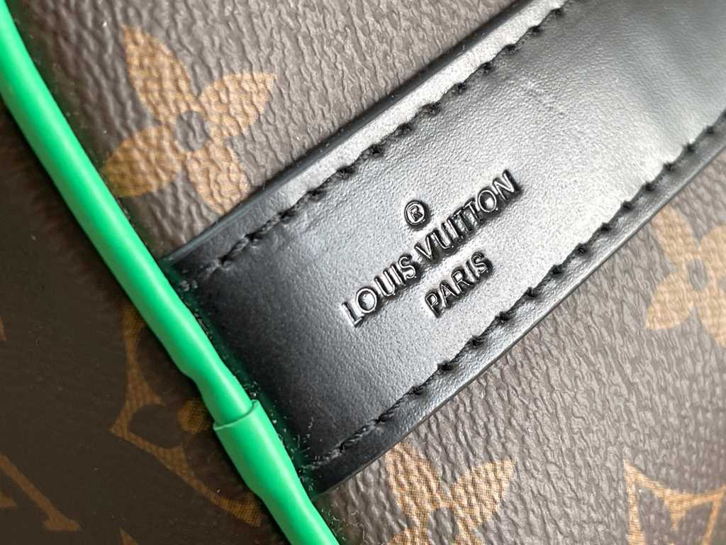 Exclusive to M20900, Louis Vuitton's iconic Keepall collection, the Monogram Macassar canvas is dipped in one of Virgil Abloh's signature brights, while the reinforced side straps and removable leather name tag continue 