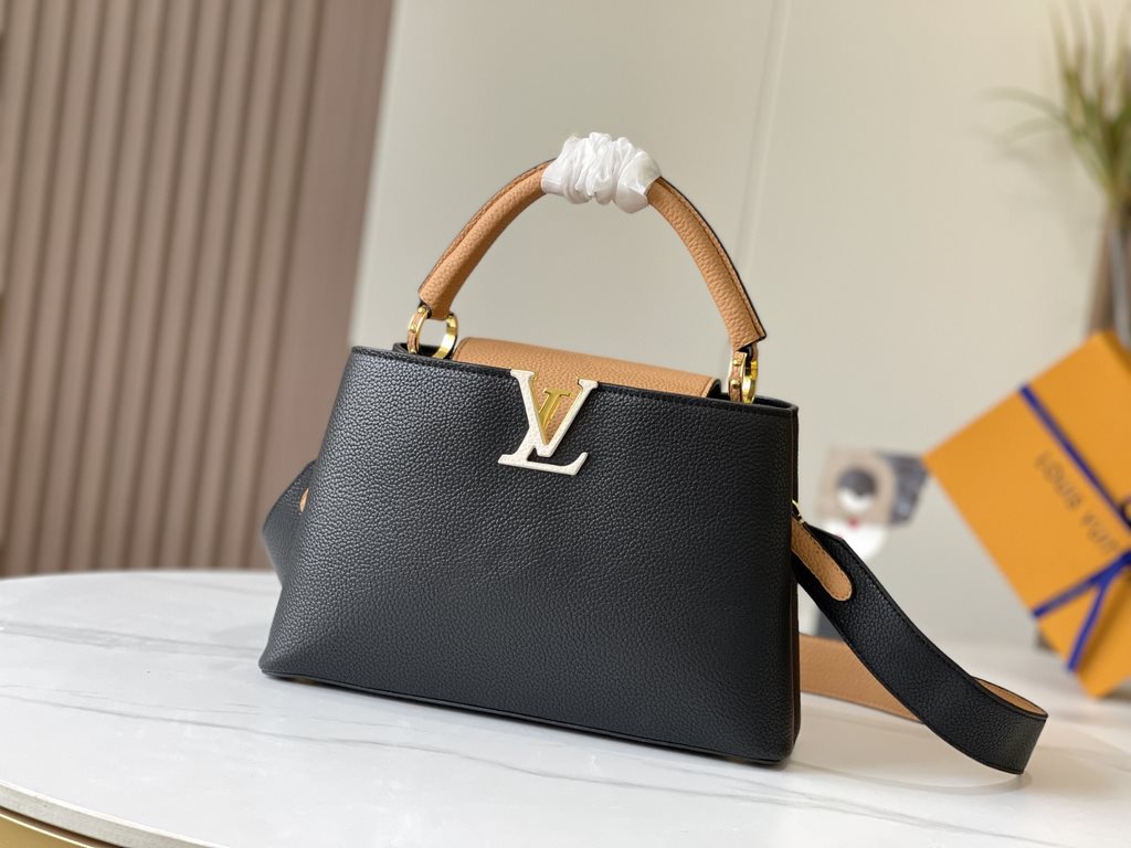 Exclusive -  M59466 Black with Almond Gold BuckleA modern clash of shades in full-grain cowhide leather, this medium Capucines bag features the iconic LV alphabet and side loops, top handles and a detachable shoulder str