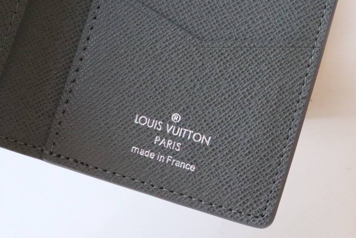 M81550Pocket walletCrafted in textured Taga leather, this pocket wallet is a classic Louis Vuitton compact. The wallet's understated color scheme and discreet LV initials logo at the bottom add an elegant touch, while th