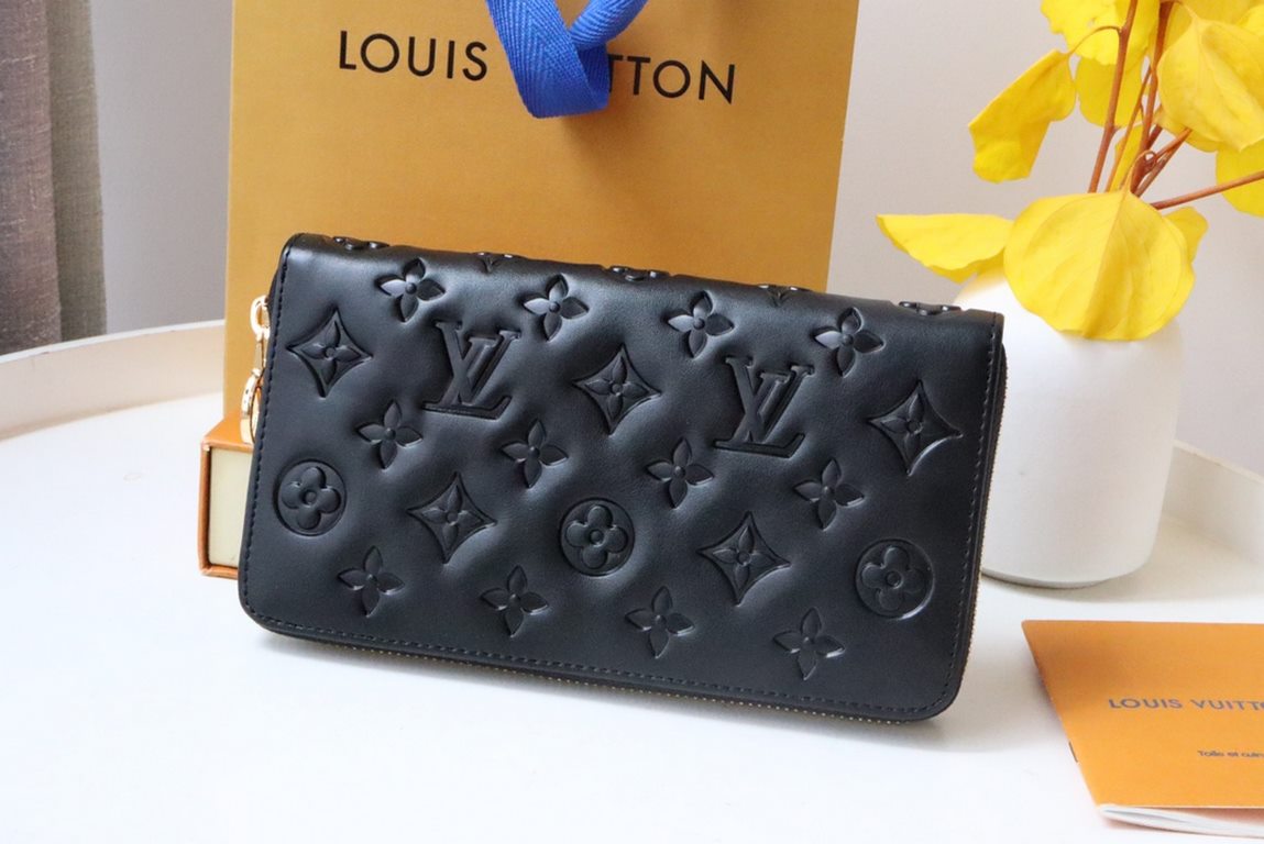 This Zipper WalletM81510Sewn in padded Monogram embossed lambskin, it complements the Coussin Leather Collection. Elegantly designed with a gold-tone zipper embellished with the LV Circle logo pull, the all-in-one wallet