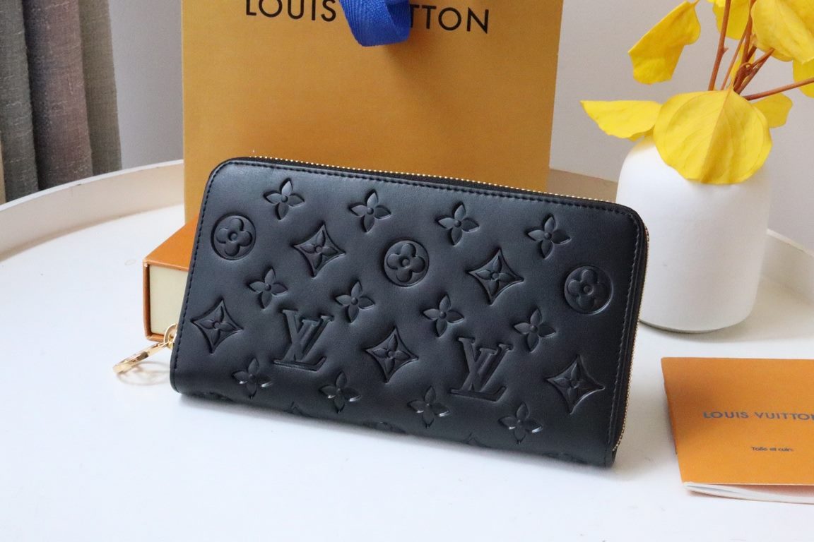 This Zipper WalletM81510Sewn in padded Monogram embossed lambskin, it complements the Coussin Leather Collection. Elegantly designed with a gold-tone zipper embellished with the LV Circle logo pull, the all-in-one wallet