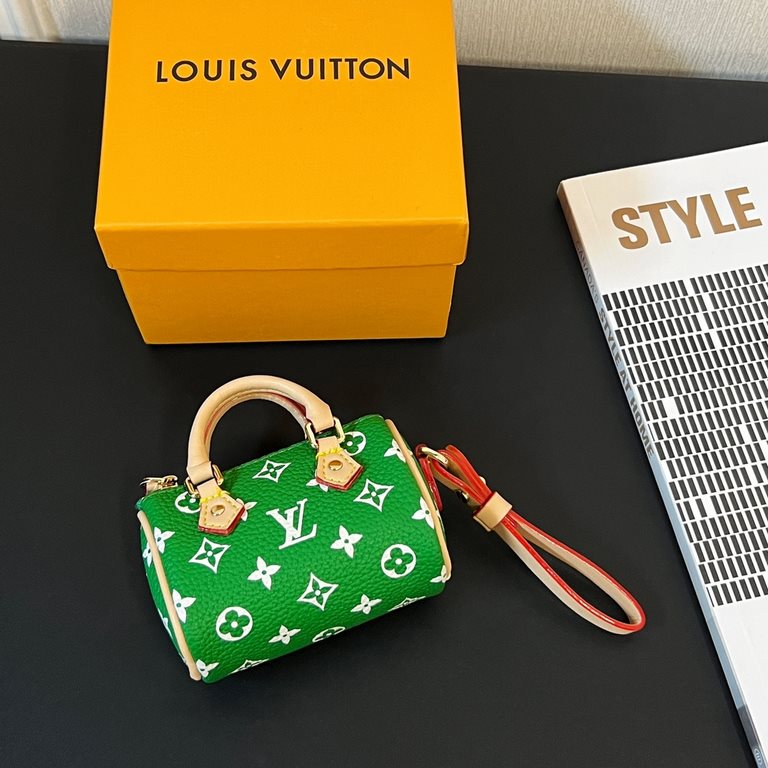 new   old pattern 5 colors In stock  MINI KEEPALL bag charm with keychain Louis Vuitton Louis Vuitton lv Mini Pillow Bag Pendant  This Mini Keepall bag and keychain is a bold and adventurous take on the classic handbag s