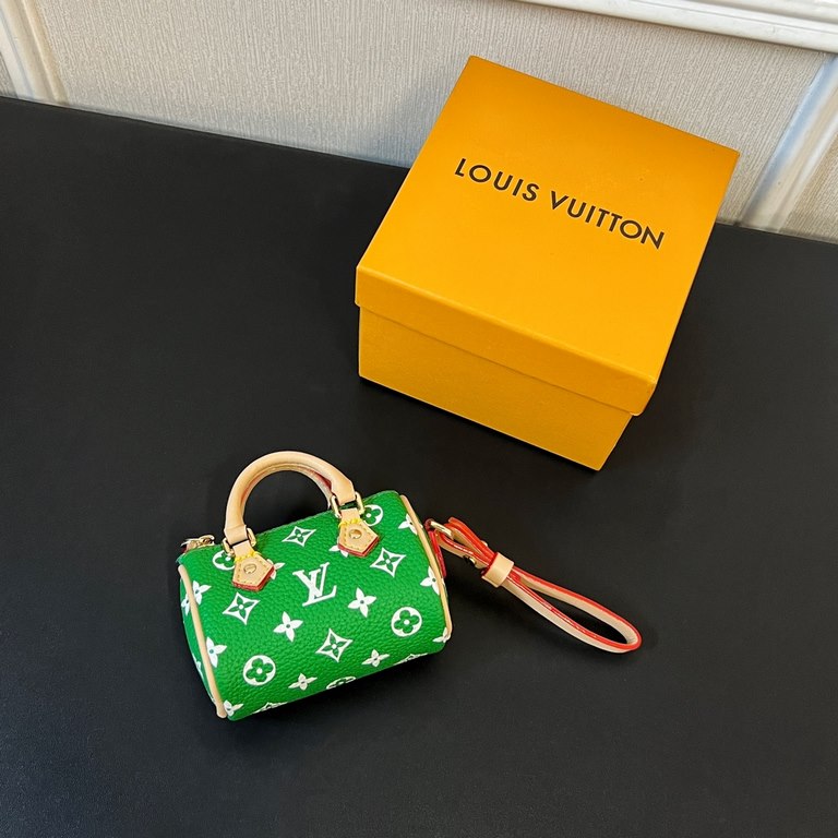 new   old pattern 5 colors In stock  MINI KEEPALL bag charm with keychain Louis Vuitton Louis Vuitton lv Mini Pillow Bag Pendant  This Mini Keepall bag and keychain is a bold and adventurous take on the classic handbag s