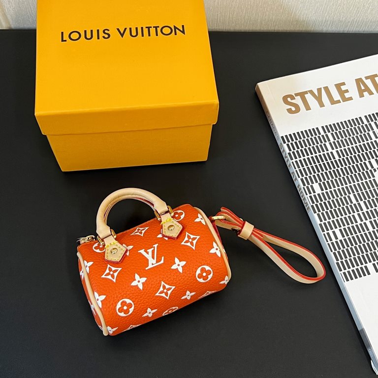 new   old pattern 5 colors In stock  MINI KEEPALL bag charm with keychain Louis Vuitton Louis Vuitton lv Mini Pillow Bag Pendant  This Mini Keepall bag and keychain is a bold and adventurous take on the classic handbag s