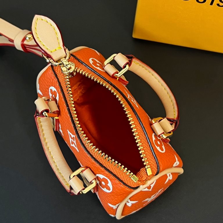 new   old pattern 5 colors In stock  MINI KEEPALL bag charm with keychain Louis Vuitton Louis Vuitton lv Mini Pillow Bag Pendant  This Mini Keepall bag and keychain is a bold and adventurous take on the classic handbag s