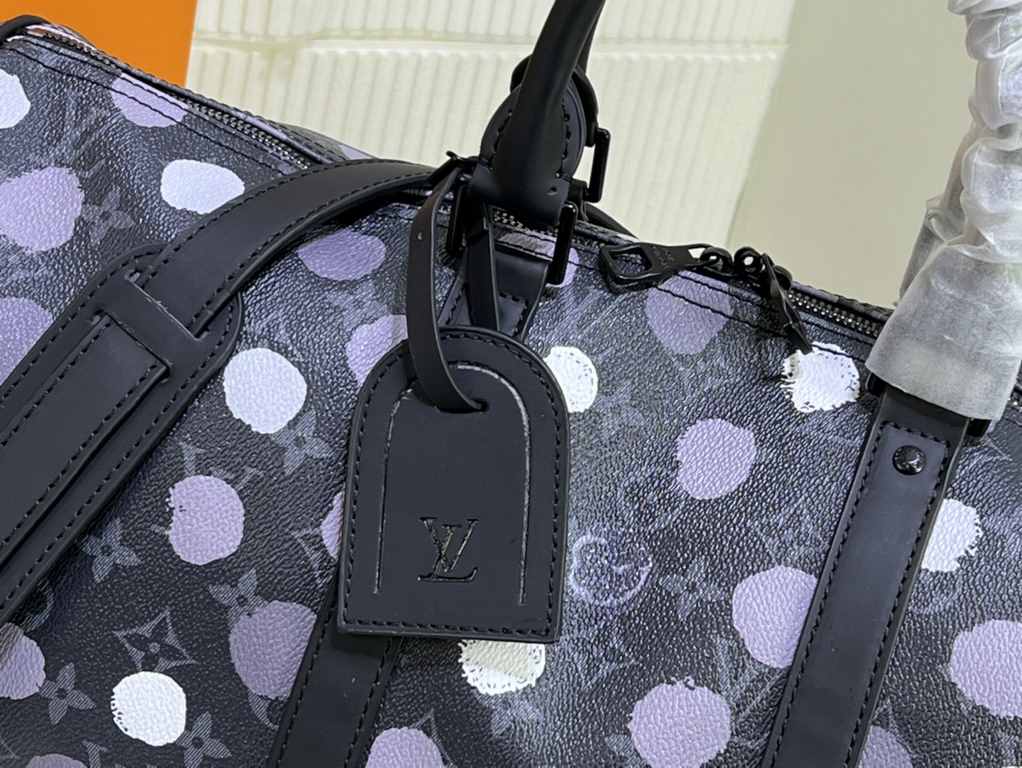 From the Louis Vuitton x Yayoi Kusama collaboration, the  M46400 M41416 LV x YK Keepall 45 travel bag celebrates the fusion of artistic creativity and craftsmanship with polka dots on Monogram Eclipse canvas, once again 