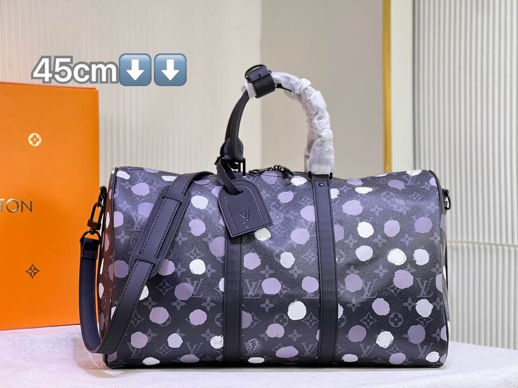 From the Louis Vuitton x Yayoi Kusama collaboration, the  M46400 M41416 LV x YK Keepall 45 travel bag celebrates the fusion of artistic creativity and craftsmanship with polka dots on Monogram Eclipse canvas, once again 