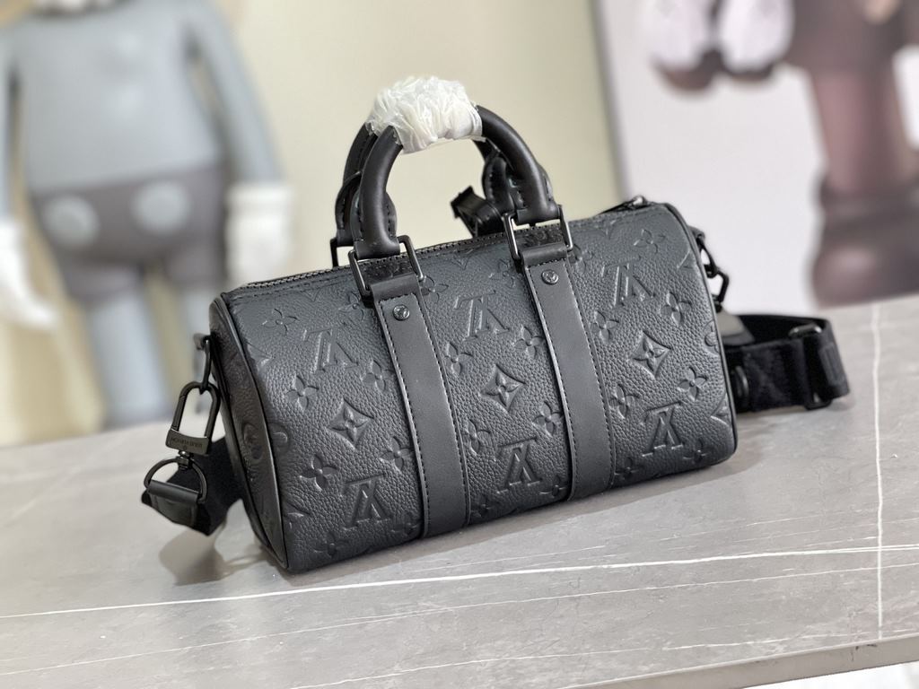 EXCLUSIVE M20900 Vintage Green Louis Vuitton's iconic Keepall collection features an innovative miniature design in Monogram Macassar canvas dipped in one of Virgil Abloh's signature bright colors, reinforced side straps