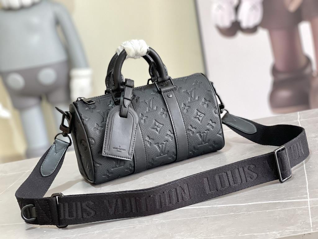 EXCLUSIVE M20900 Vintage Green Louis Vuitton's iconic Keepall collection features an innovative miniature design in Monogram Macassar canvas dipped in one of Virgil Abloh's signature bright colors, reinforced side straps