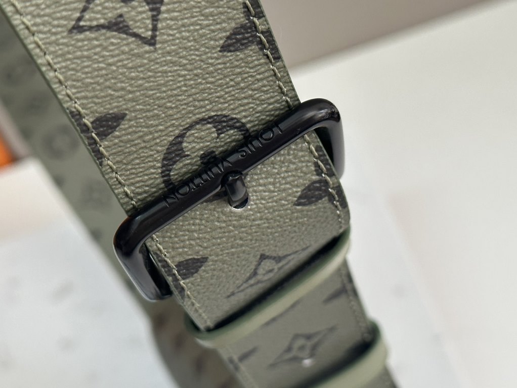 Model No. M23838 Green   This LV Moon Crossbody is made from supple coated canvas for a minimalist design, with an on-trend colorful lining and bold Louis Vuitton lettering. The half-moon silhouette flatters your body an