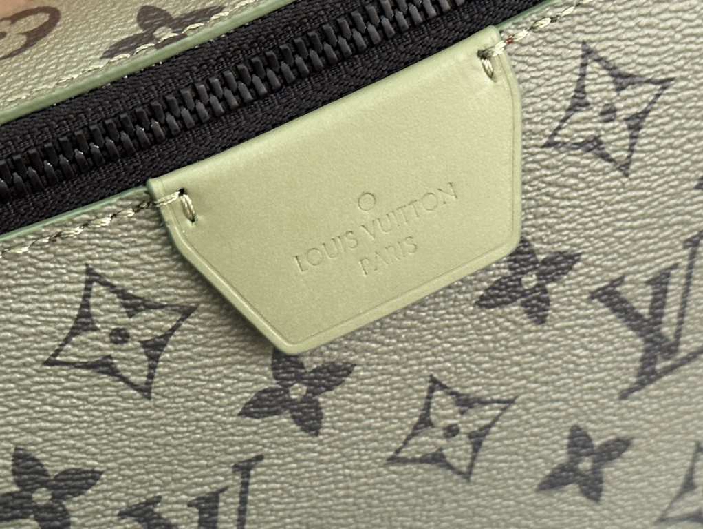 Model No. M23838 Green   This LV Moon Crossbody is made from supple coated canvas for a minimalist design, with an on-trend colorful lining and bold Louis Vuitton lettering. The half-moon silhouette flatters your body an