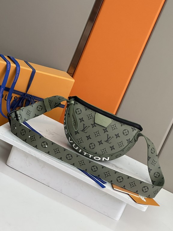 Model No. M23838 Green   This LV Moon Crossbody is made from supple coated canvas for a minimalist design, with an on-trend colorful lining and bold Louis Vuitton lettering. The half-moon silhouette flatters your body an