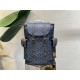 M46338 This Christopher MM backpack is made of coated canvas with a blue LV and Monogram floral pattern on a dark background. Finished with black leather trims and contrasting stitching, the bag is complemented by the LV