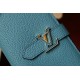 M81330This LV Vertical walletInspired by Capucines handbags, this wallet in soft grained Taurillon leather is embellished with LV letters for the sliding closure. It opens to reveal a color-blocked lining and features a 