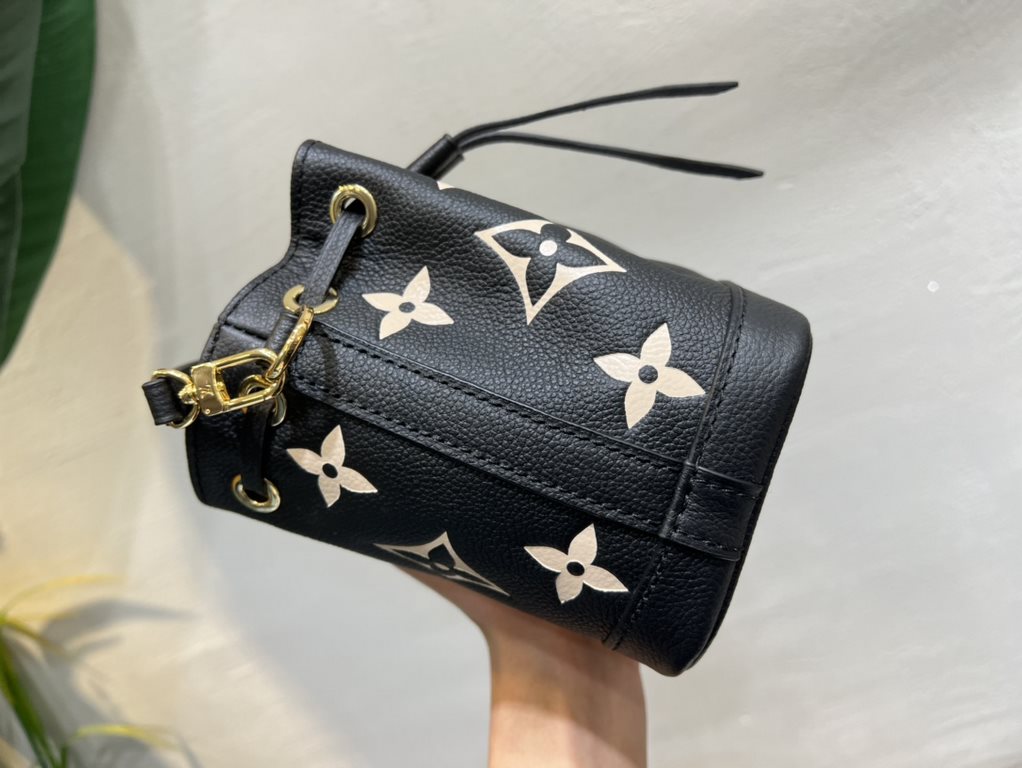 M46291 Grey Grams This Nano Noé bag is printed and embossed in leather with LV's alphabet and Monogram florals for an eye-catching look that will captivate the eye. Plenty of room for your daily needs, with an adjustable