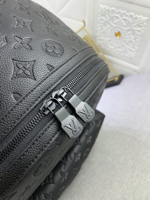 Upgraded from the original M46553 Black Flower Embossed This Discovery duffel bag is made of soft Monogram Eclipse coated canvas fabric with the subdued touch of metal pieces. The exterior pockets provide easy access to 