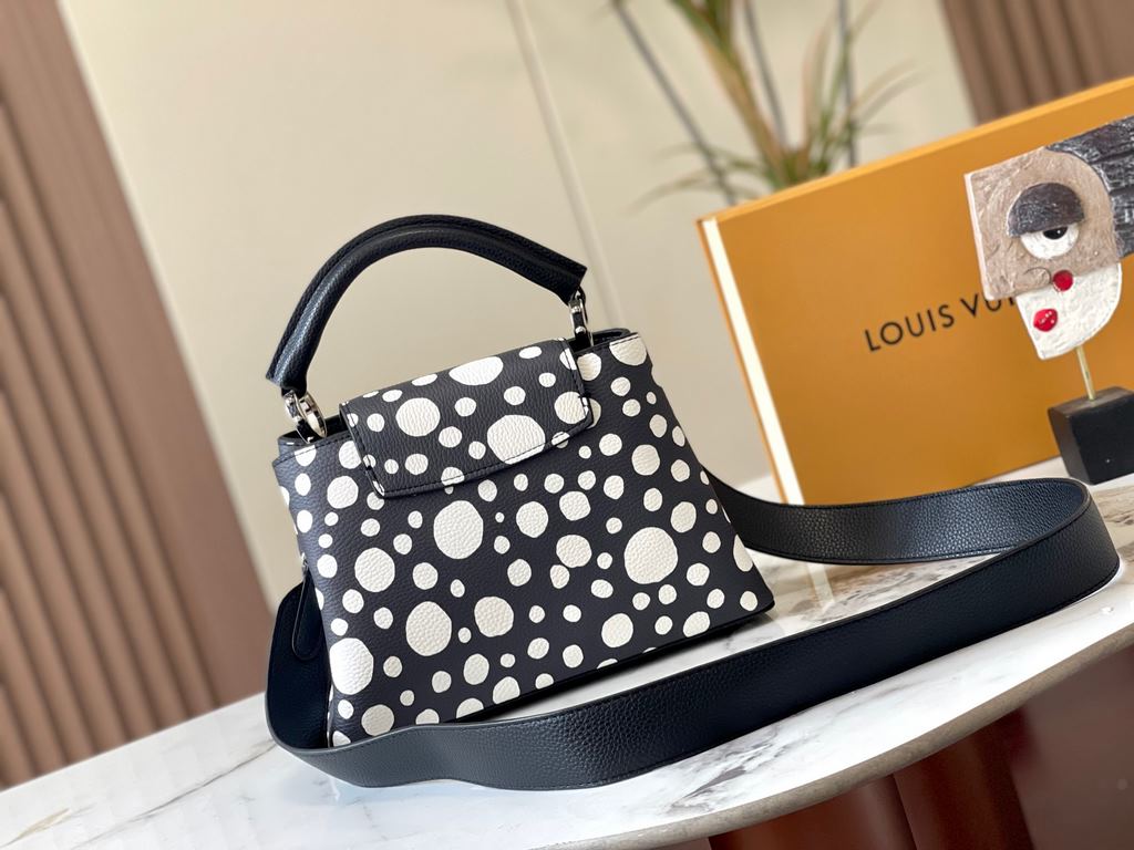 EXCLUSIVE SHOOTING - M21663 From the Louis Vuitton x Yayoi Kusama collaboration comes this LV x YK Capucines pouch. The renowned Japanese artist's childhood obsession with polka dots as a symbol of infinity finds dazzlin