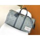 ￥  Top Original M22532 Denim This Keepall Bandoulière 50 travel bag is embossed with a Monogram pattern in faded denim, reinventing one of Louis Vuitton's classic designs. The reinforced side straps and top handle are ma