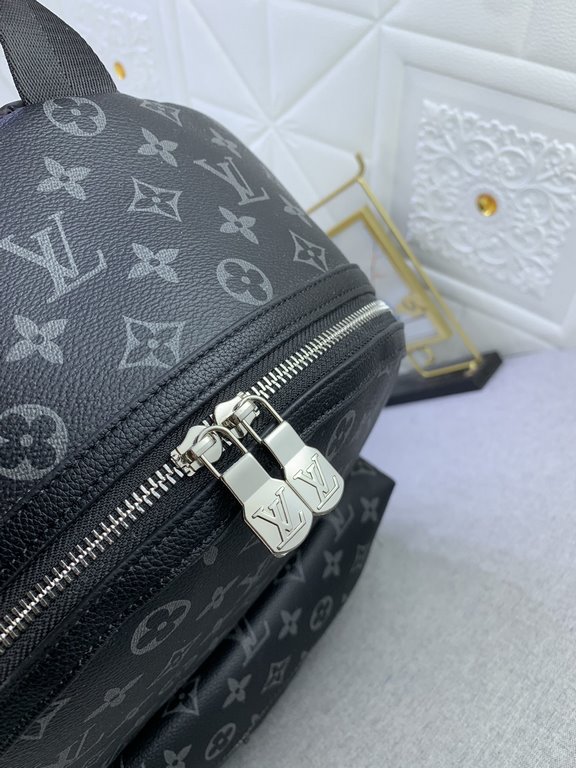 Upgraded from the original M46553 Black Flower Embossed This Discovery duffel bag is made of soft Monogram Eclipse coated canvas fabric with the subdued touch of metal pieces. The exterior pockets provide easy access to 