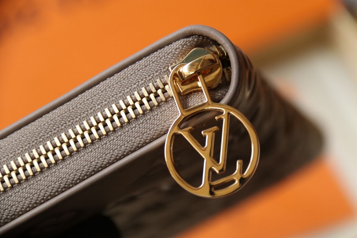 This Zipper WalletM81510Sewn in padded Monogram embossed lambskin, it complements the Coussin Leather Collection. Elegantly designed with a gold-tone zipper embellished with the LV Circle logo pull, the all-in-one wallet