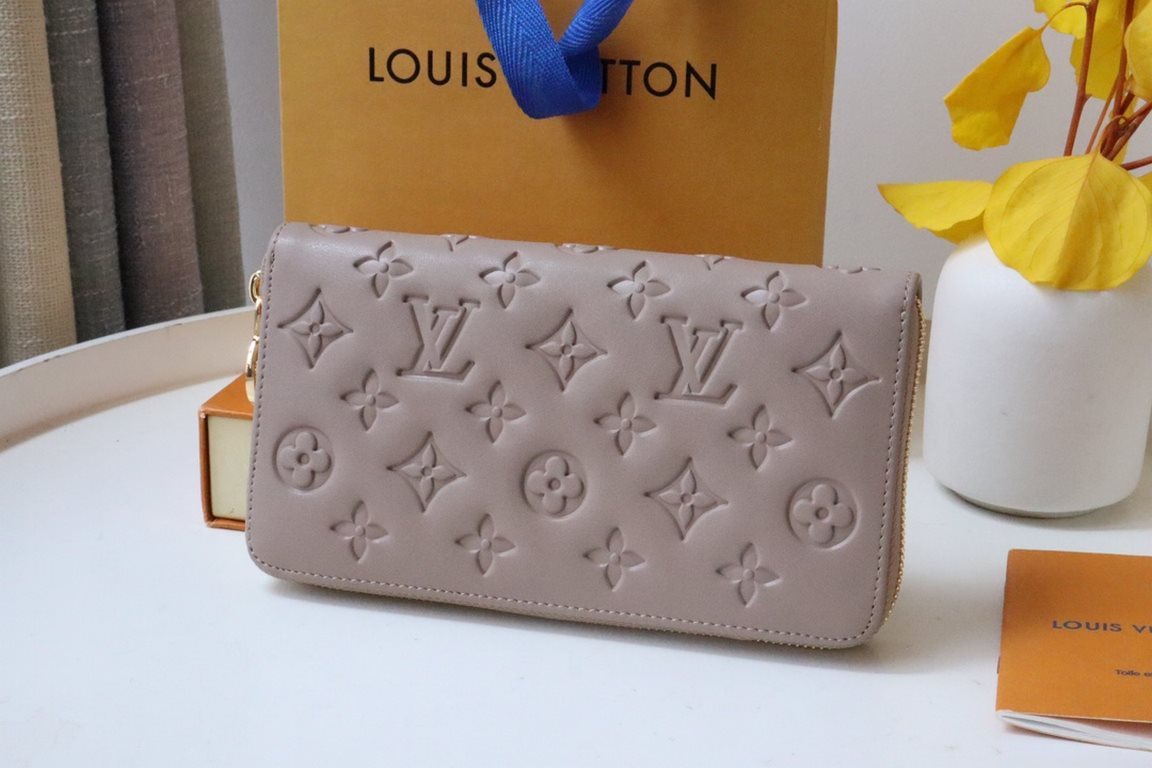 This Zipper WalletM81510Sewn in padded Monogram embossed lambskin, it complements the Coussin Leather Collection. Elegantly designed with a gold-tone zipper embellished with the LV Circle logo pull, the all-in-one wallet