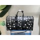 From the Louis Vuitton x Yayoi Kusama collaboration, the M46401 Louis Vuitton x YK Keepall 55 travel bag celebrates the fusion of artistic creativity and craftsmanship with polka dots on Monogram Eclipse canvas, once aga