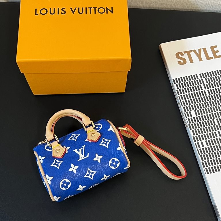 new   old pattern 5 colors In stock  MINI KEEPALL bag charm with keychain Louis Vuitton Louis Vuitton lv Mini Pillow Bag Pendant  This Mini Keepall bag and keychain is a bold and adventurous take on the classic handbag s