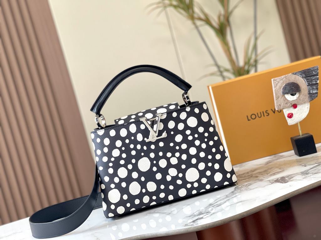 EXCLUSIVE SHOOTING - M21665 From the Louis Vuitton x YK Capucines collaboration, this medium-sized LV x Yayoi Kusama bag is a dazzling expression of the famous Japanese artist's childhood obsession with polka dots as a s