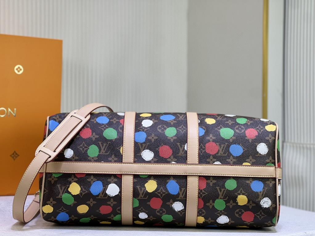 M46400 46377 41416 From the Louis Vuitton x Yayoi Kusama collaboration, the Louis Vuitton x Yayoi Kusama Keepall 45 travel bag celebrates the fusion of artistic creativity and craftsmanship with polka dots on Monogram Ec