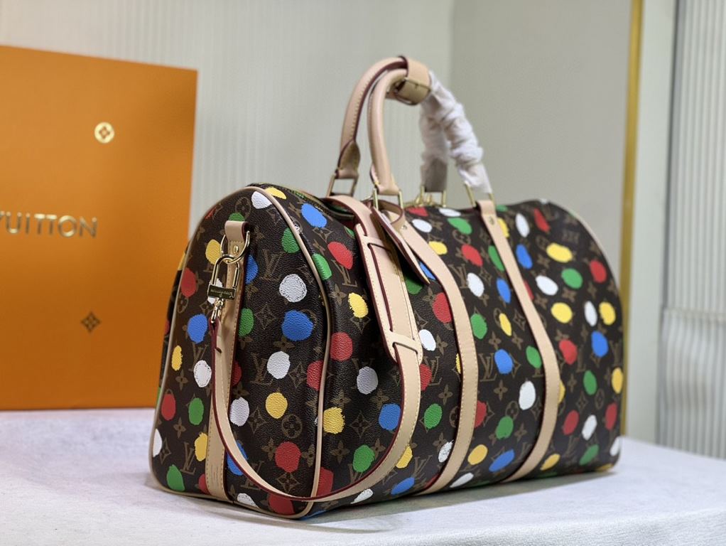 M46400 46377 41416 From the Louis Vuitton x Yayoi Kusama collaboration, the Louis Vuitton x Yayoi Kusama Keepall 45 travel bag celebrates the fusion of artistic creativity and craftsmanship with polka dots on Monogram Ec