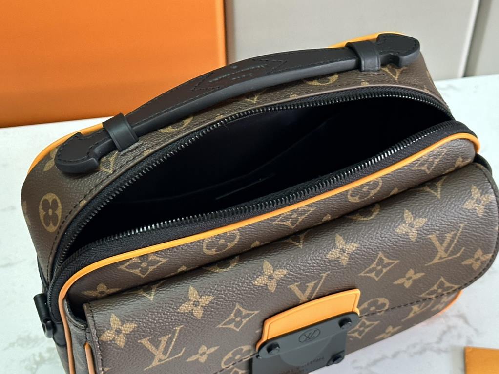 New  M46688 Old Flower Yellow LeatherMen's Bag Messenger Bag Collection The S Lock messenger bag in Monogram Macassar canvas features a new closure inspired by Georges Vuitton's 1886 suitcase closure. A special finishing