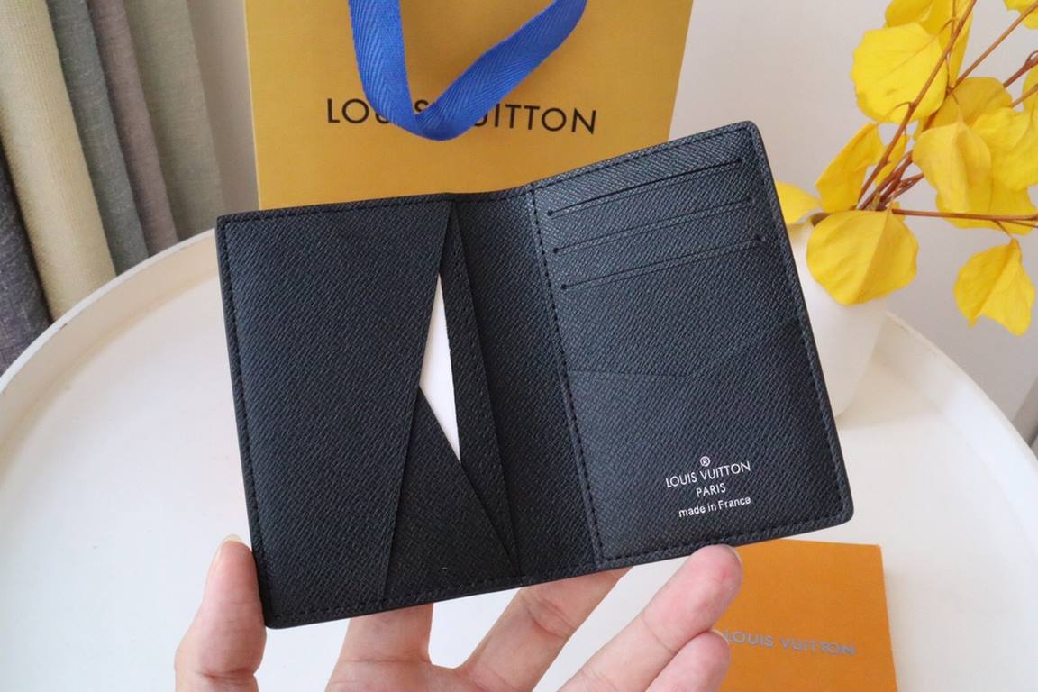 M81550Pocket walletCrafted in textured Taga leather, this pocket wallet is a classic Louis Vuitton compact. The wallet's understated color scheme and discreet LV initials logo at the bottom add an elegant touch, while th