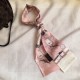 Super nice LV silk scarf! Double layered silk!Multi-purpose, tie it around your bag, use it as a hair tie or a small scarf, all very chic  !It also looks great with a simple bottom or a shirt around your neck!  100% silk