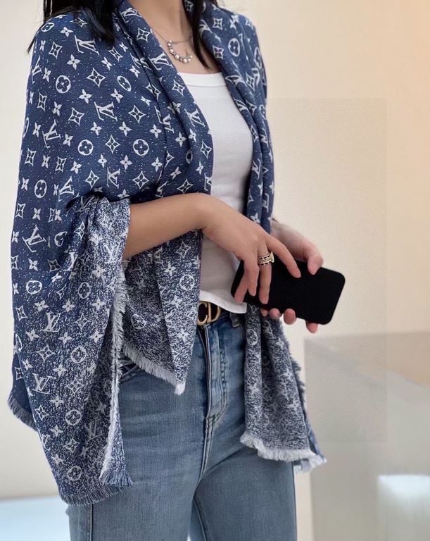 Pricelv2023's newest shawl has a gradient effect that resembles the chic texture of beloved jeans washed over time. The gorgeous silk-wool blend is cut to a generous size for a variety of styling possibilities. The      