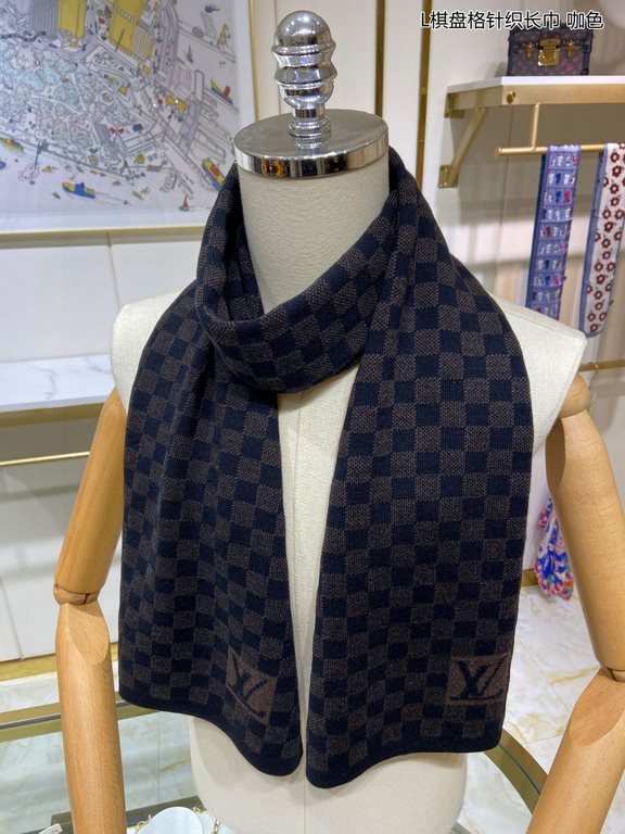 PriceCounter Sync   Donkey's new L Tessellated Knit Scarf features an eye-catching, classic Damier tessellated pattern with oversized LV letters and a rustic trim. The soft cashmere is a gorgeous texture. Highly recommen