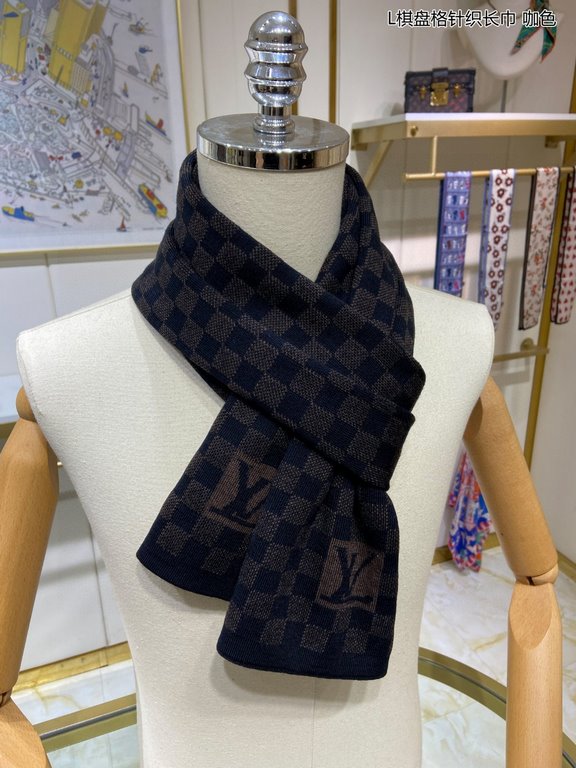 PriceCounter Sync   Donkey's new L Tessellated Knit Scarf features an eye-catching, classic Damier tessellated pattern with oversized LV letters and a rustic trim. The soft cashmere is a gorgeous texture. Highly recommen