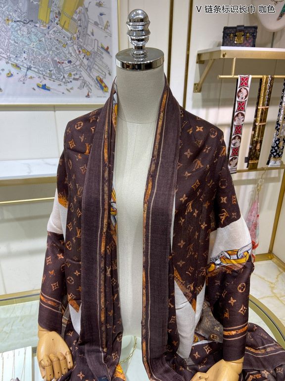 Price.   Donkey family new [V chain logo long scarf] cashmere long scarf, show LV letters in the classic Monogram pattern of dexterity changes, floral elements intertwined arrangement, embellished tassel trim. This size 