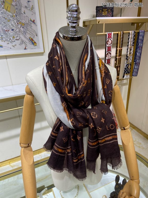 Price.   Donkey family new [V chain logo long scarf] cashmere long scarf, show LV letters in the classic Monogram pattern of dexterity changes, floral elements intertwined arrangement, embellished tassel trim. This size 