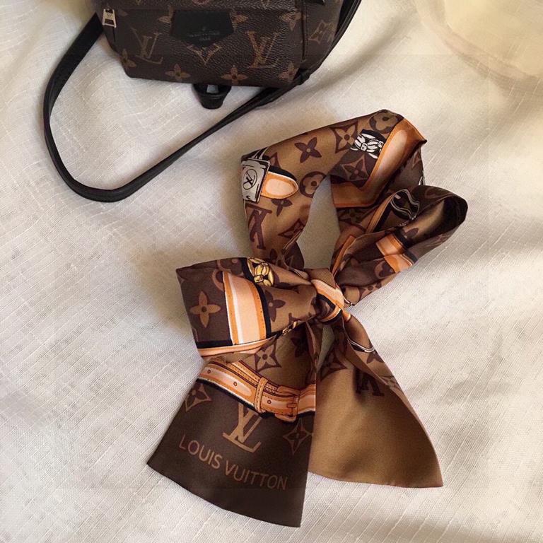 Super nice LV silk scarf! Double layered silk!Multi-purpose, tie it around your bag, use it as a hair tie or a small scarf, all very chic  !It also looks great with a simple bottom or a shirt around your neck!  100% silk